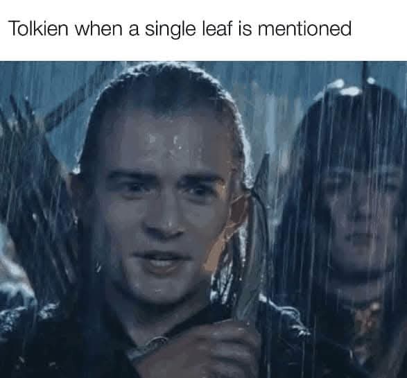 A close-up shot of a man with wet hair and a serious expression, standing in heavy rain while holding a bow. Another person…