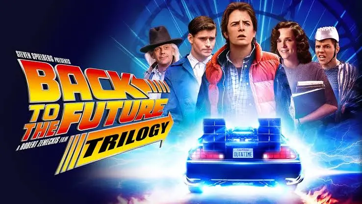 A promotional poster for the 'Back to the Future Trilogy' movie series, featuring the main characters—Marty McFly, Doc…