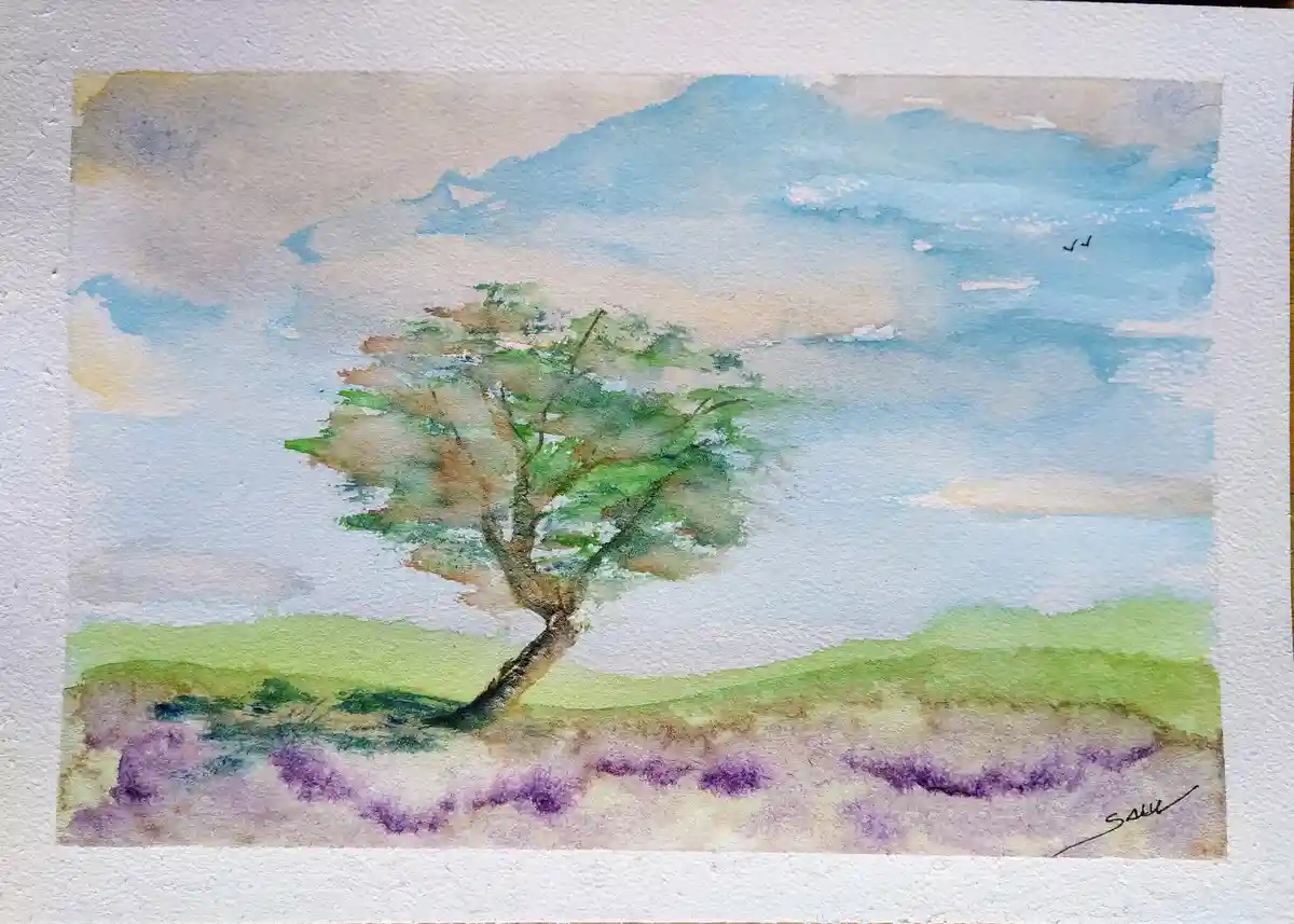 A watercolor painting depicts a solitary tree with a gnarled trunk and green foliage, standing on a hillside with purple…