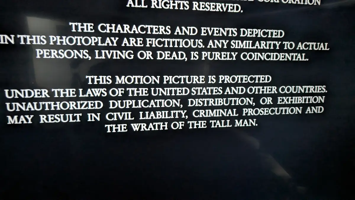 A close-up of a movie copyright screen with standard legal disclaimers, but the final line is altered to read 'THE WRATH OF…