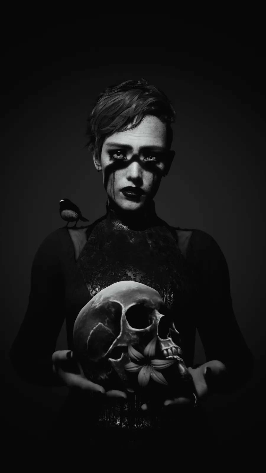 A black-and-white portrait of a person with short hair, dark makeup, and a shadow cast across their face, holding a skull…