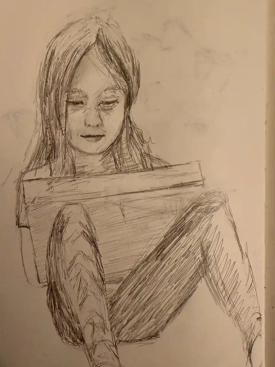 A pencil sketch of a person with long hair, eyes closed, and a book resting across their lap. The person appears to be…