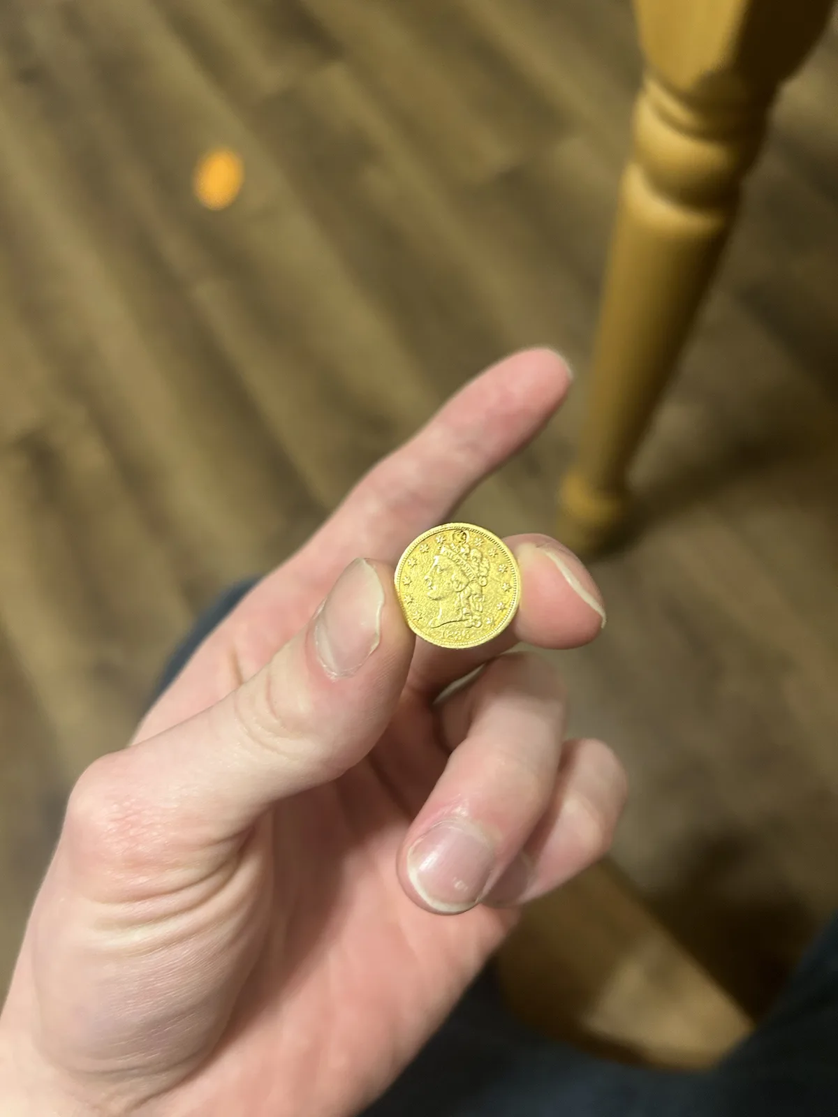 A classic 1836 $2.50 coin, expertly plugged and cleaned