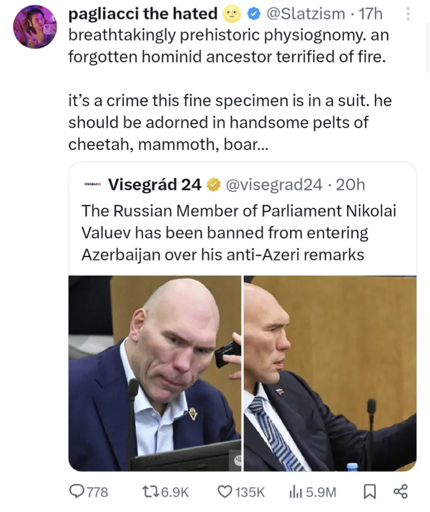 A split image shows Nikolai Valuev, a bald Russian parliamentarian, looking sternly at a laptop in one panel and speaking…