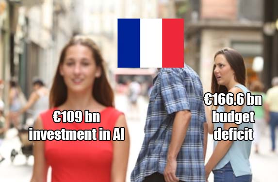 A man in a plaid shirt stands with his back to the viewer, facing a woman in a red top who is smiling. A French flag is…