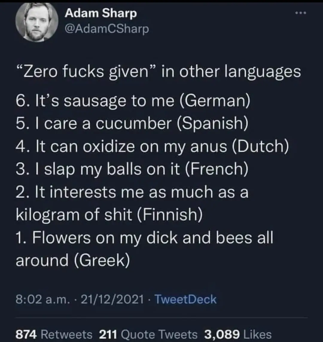 A screenshot of a tweet by Adam Sharp listing humorous, literal translations of 'zero fucks given' into various languages…