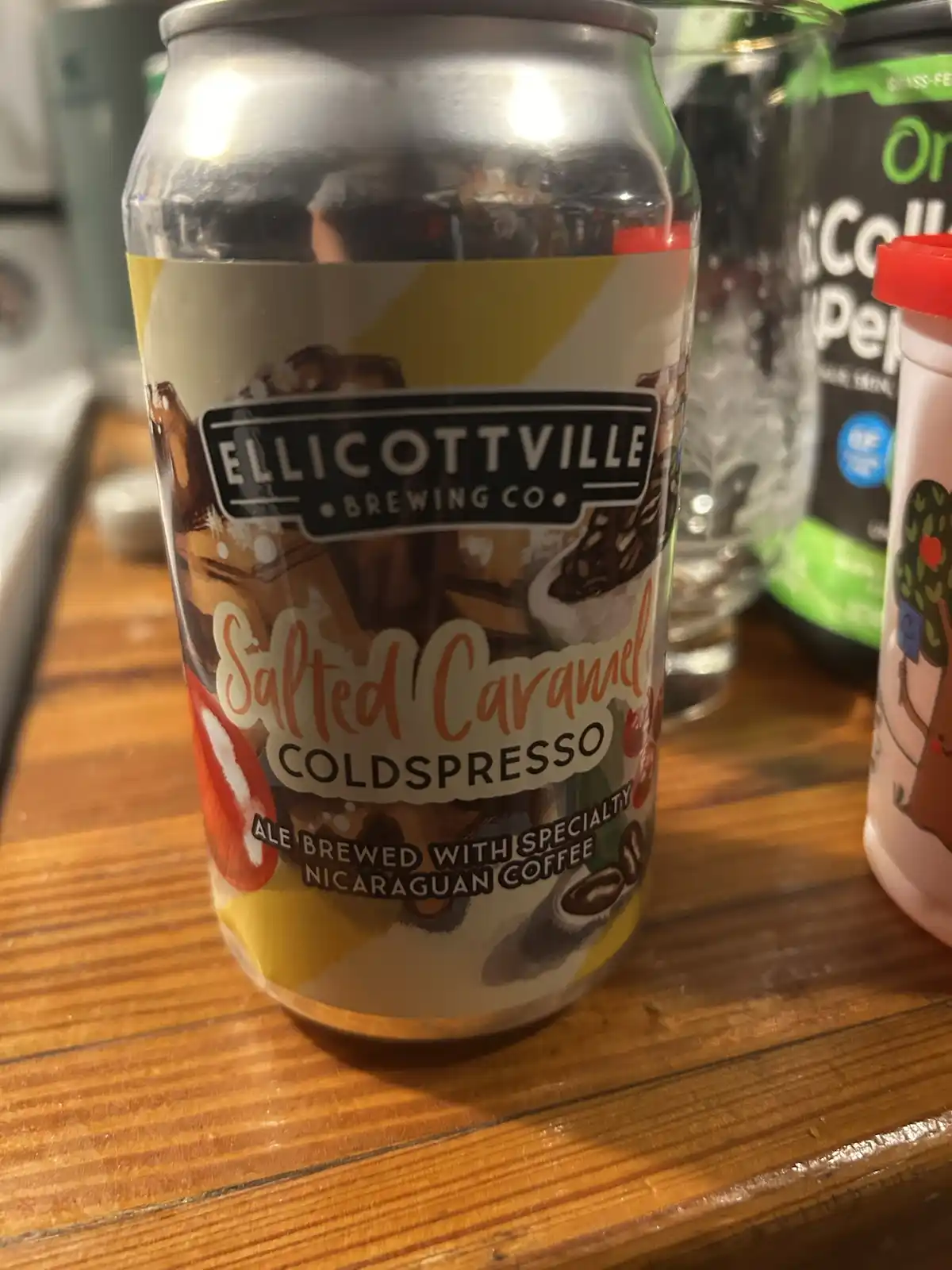 A close-up photo of a silver beer can from Ellicottville Brewing Co. labeled 'Salted Caramel COLDSPRESSO', an ale brewed…