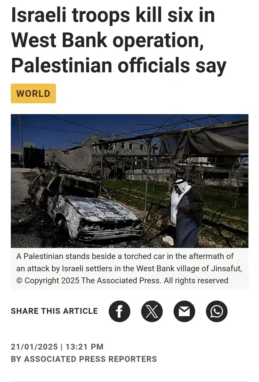 A screenshot of a news article from The Associated Press shows a Palestinian man standing beside a burnt-out car in a…