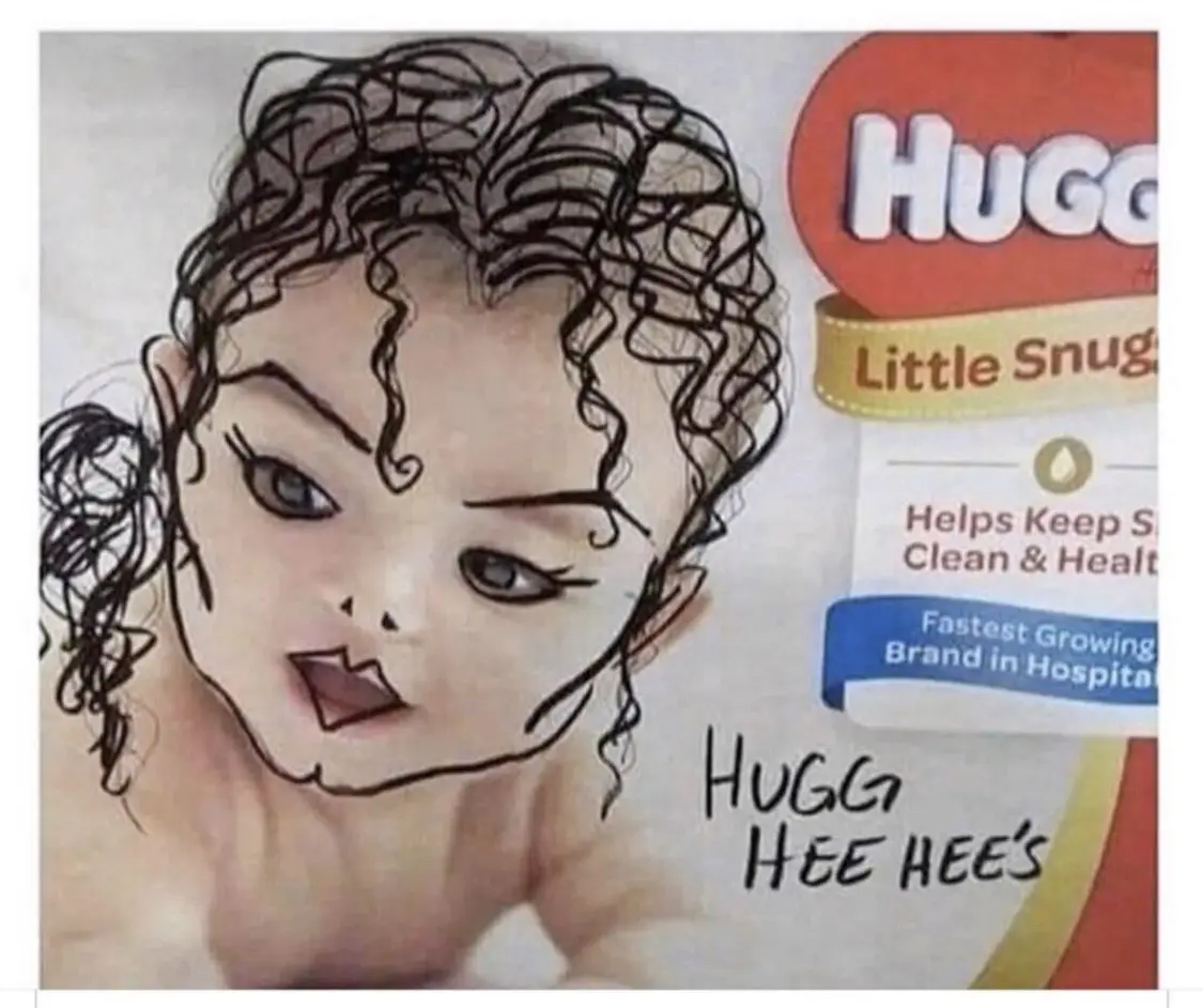 A baby product package for Huggies Little Snug diapers features a crudely drawn, exaggerated cartoon baby with wild curly…