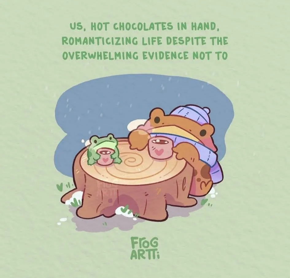 Two cartoon frogs, one large and one small, are cozily sitting on a tree stump in the snow, each holding a mug of hot…