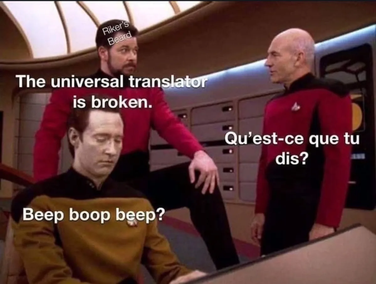 Three Star Trek characters are shown in a ship's bridge. The man in the yellow uniform at the console looks confused and…