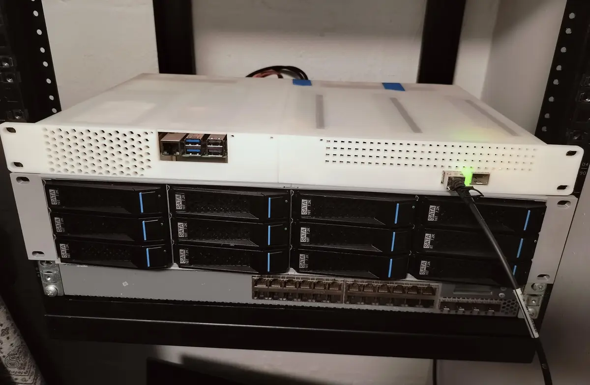 A white server rack unit with multiple black SATA hard drives stacked vertically, showing labels like 'SATA 10T 7.2K'. The…