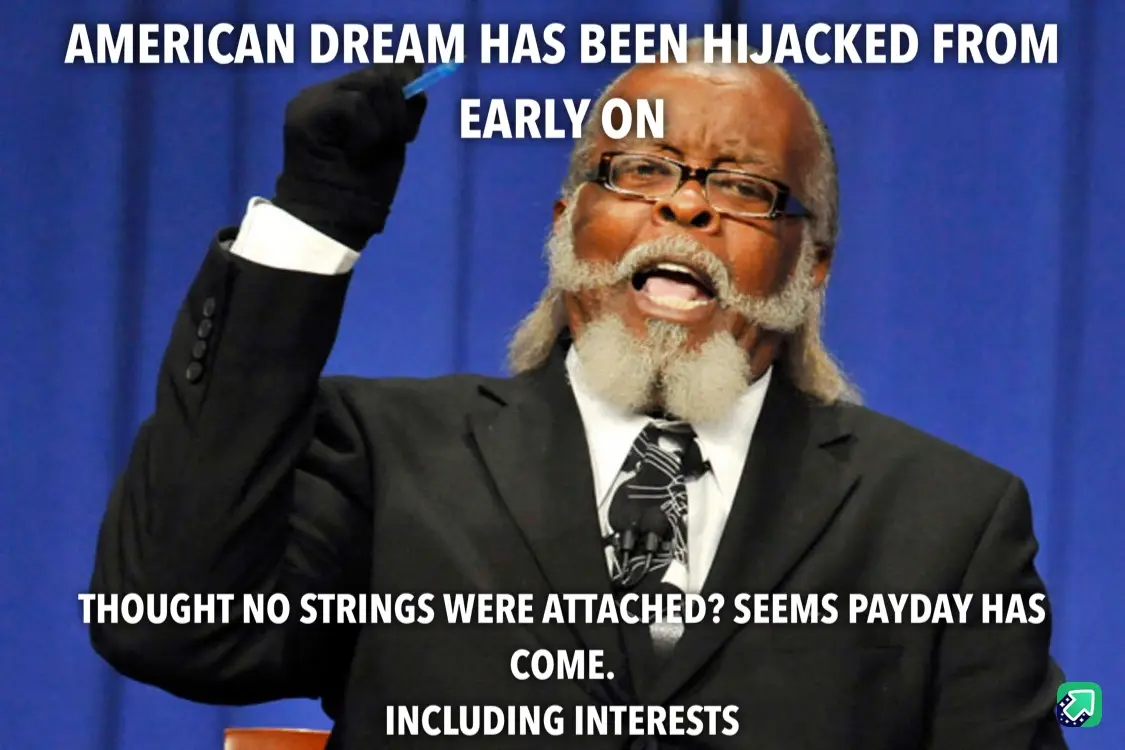 A man in a black suit, white shirt, and patterned tie stands before a blue curtain, holding a pen in his gloved right hand…