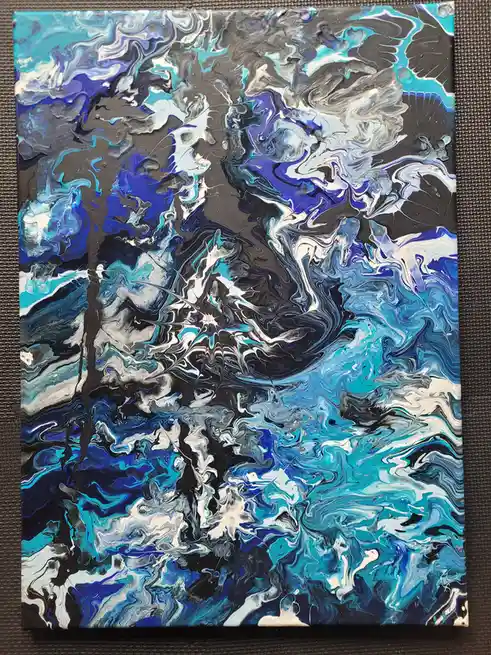 A square canvas displays a vibrant abstract painting with swirling patterns of blue, white, and black paint, resembling…