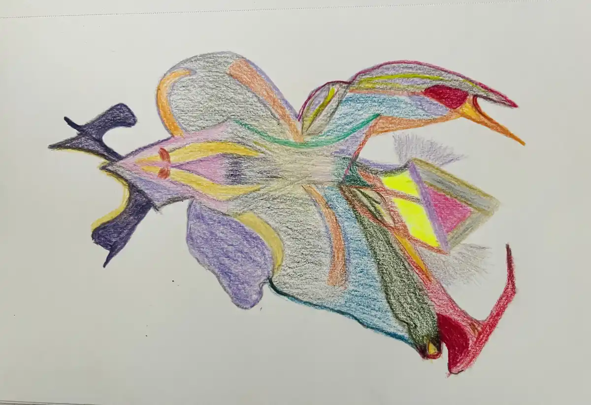A colorful crayon drawing on white paper depicts an abstract, symmetrical, and chaotic floral or insect-like creature with…