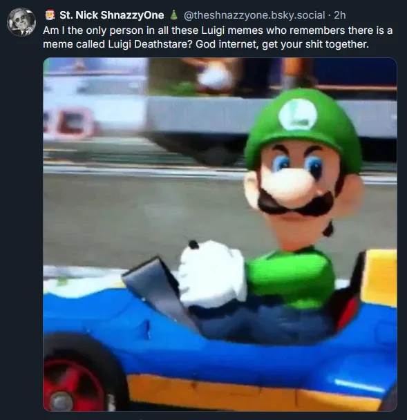 A screenshot of a tweet by St. Nick ShnazzzyOne shows a blurry image of Luigi from Mario Kart driving a blue and yellow…
