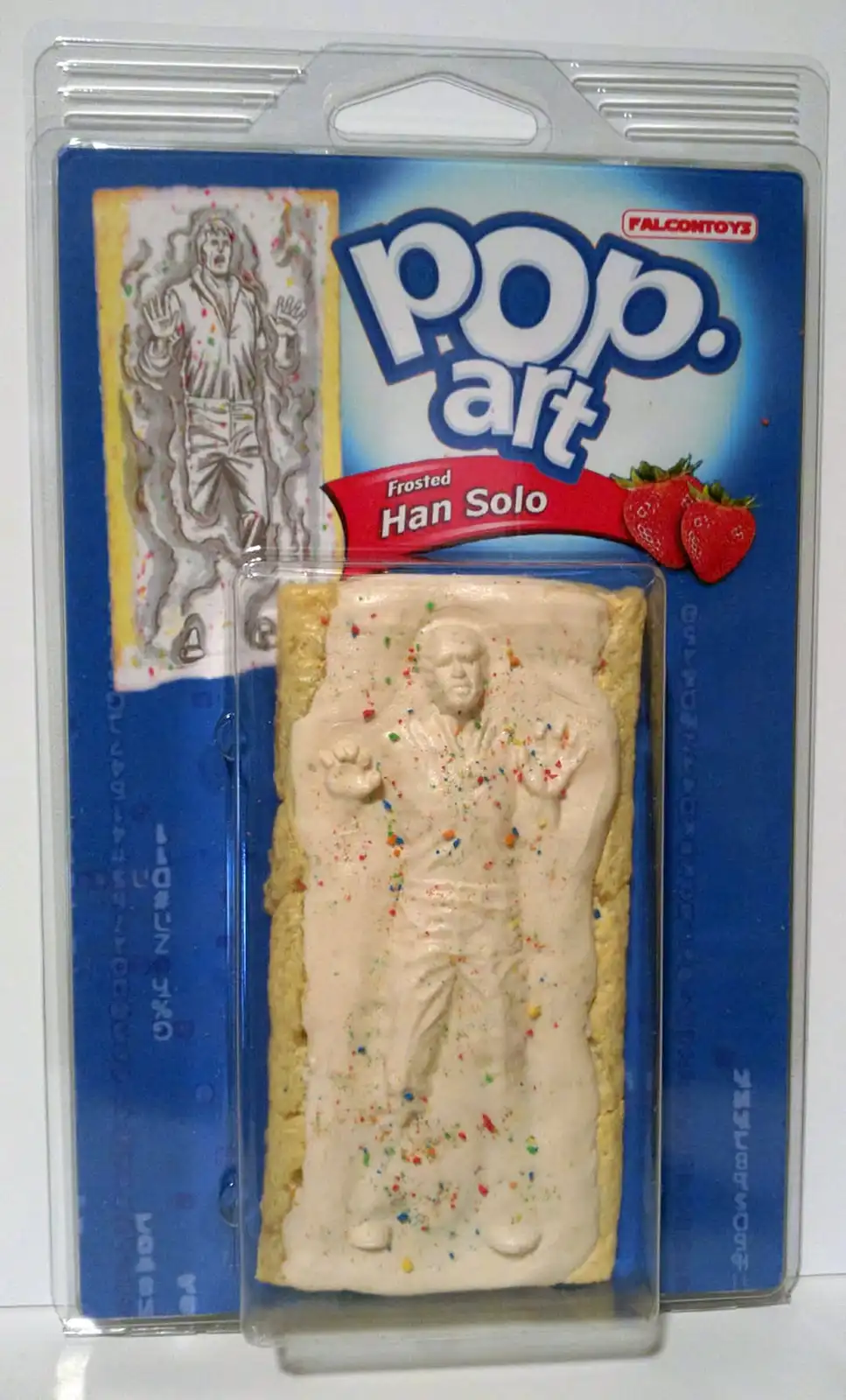 A packaged snack resembling a cookie with frosting and sprinkles molded into the shape of Han Solo frozen in carbonite…