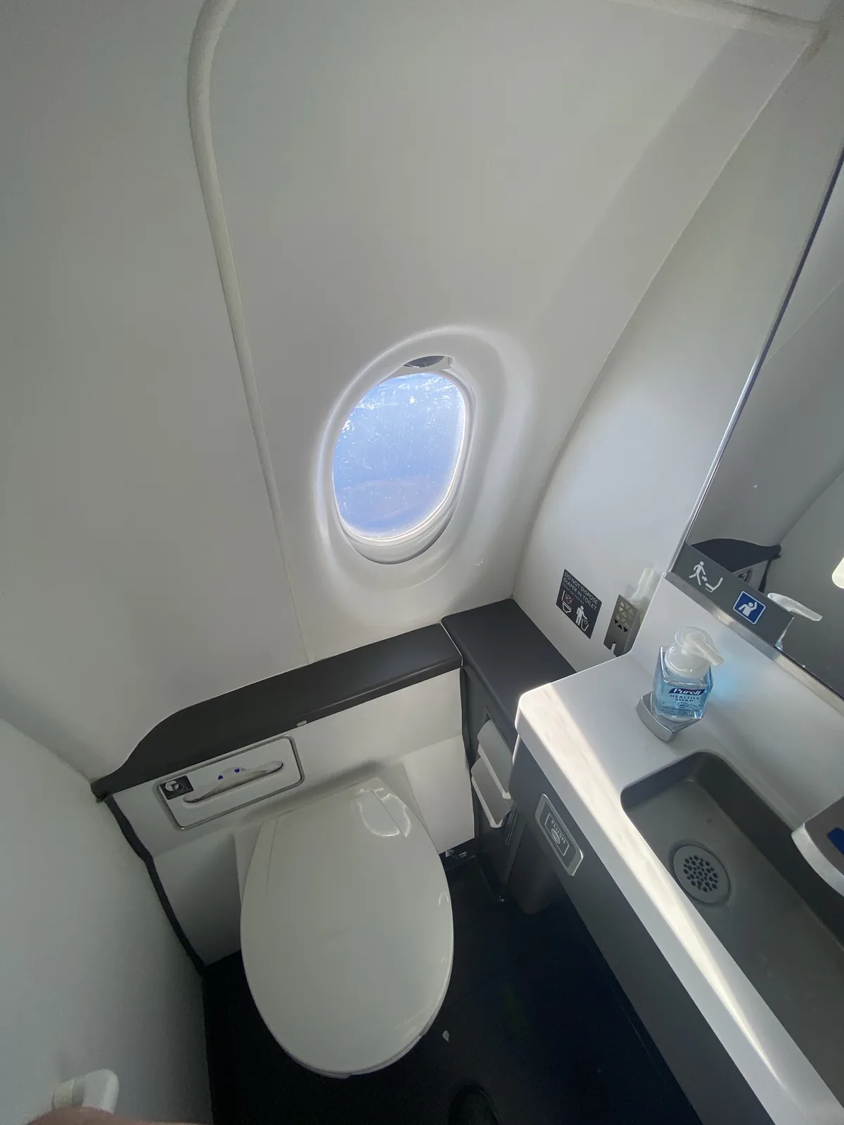 This Plane's Bathroom Has a Window? What Were They Thinking!