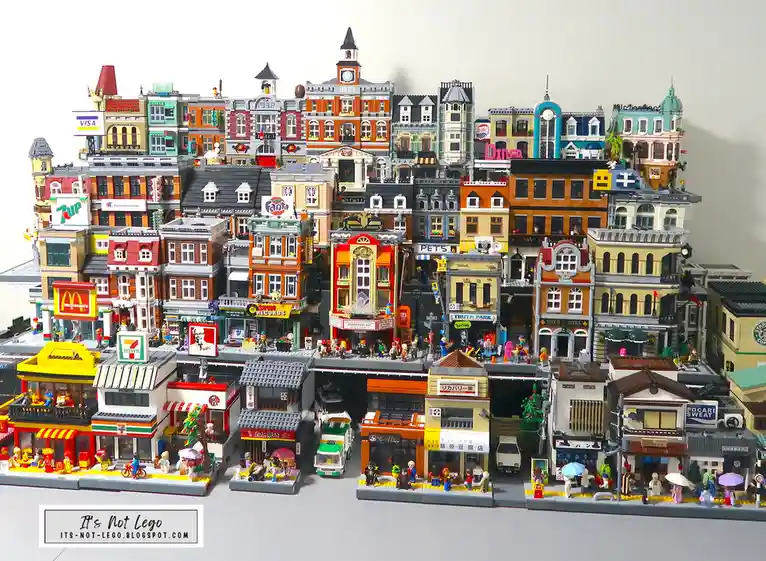 A detailed diorama of a bustling city street made from small, interlocking plastic bricks, featuring numerous recognizable…