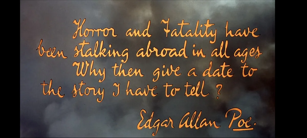 The image displays a quote in orange cursive script against a dark, cloudy sky background. The text reads: 'Horror and…