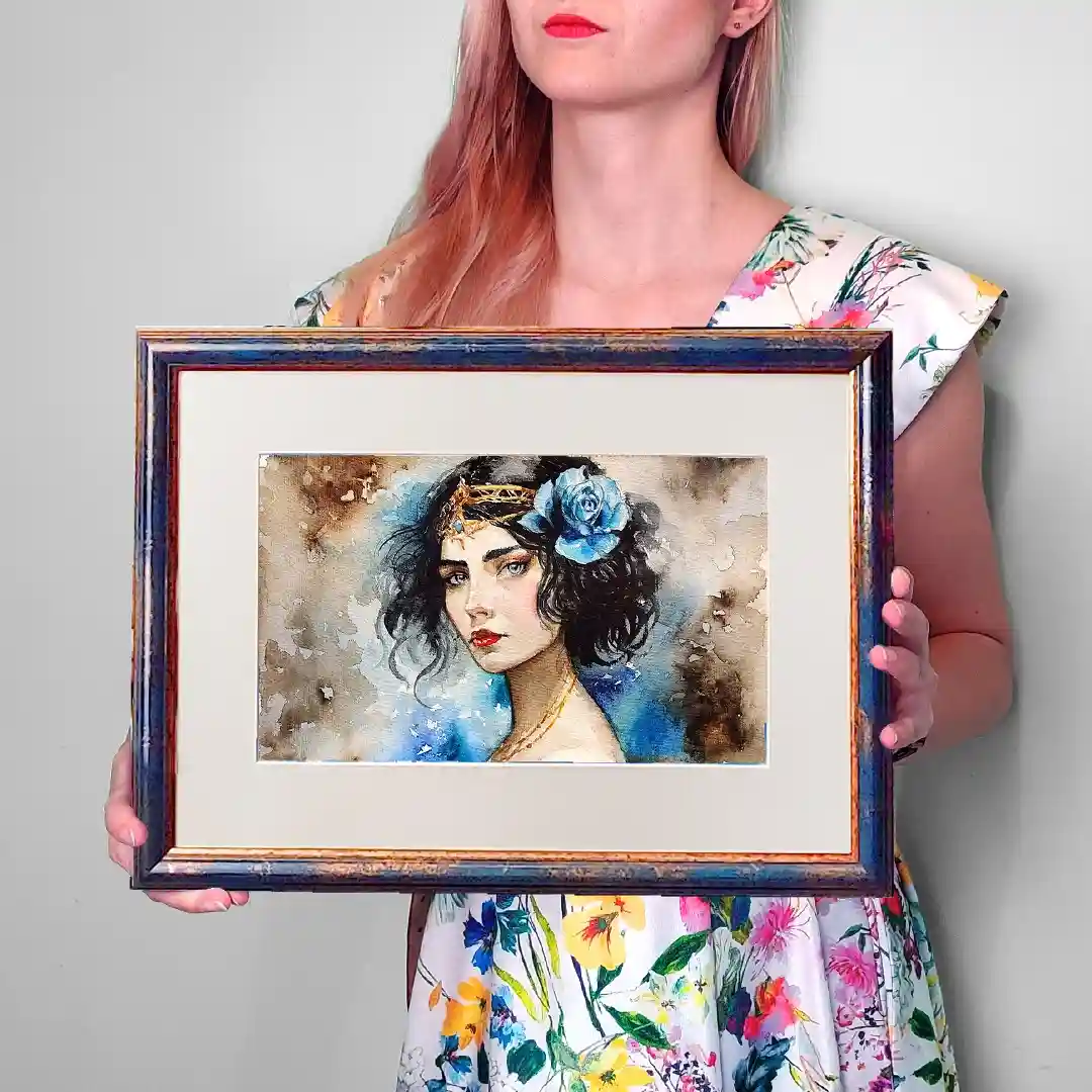 a woman with pinkish hair and floral dress holds a framed watercolor portrait of a woman with dark hair, a blue rose in her…