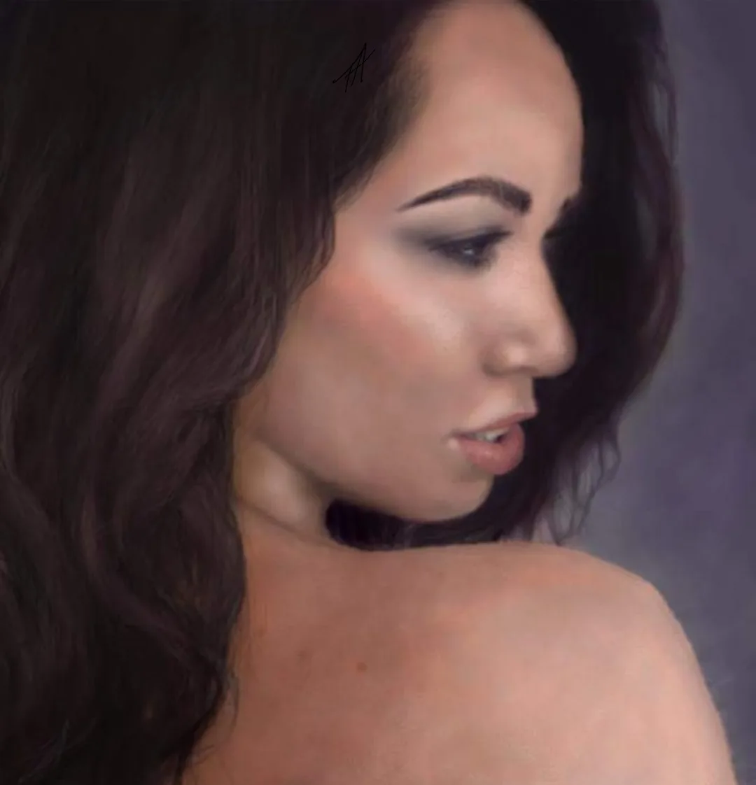 A woman with long dark hair and makeup is shown in profile, looking down and away from the camera. Her expression appears…