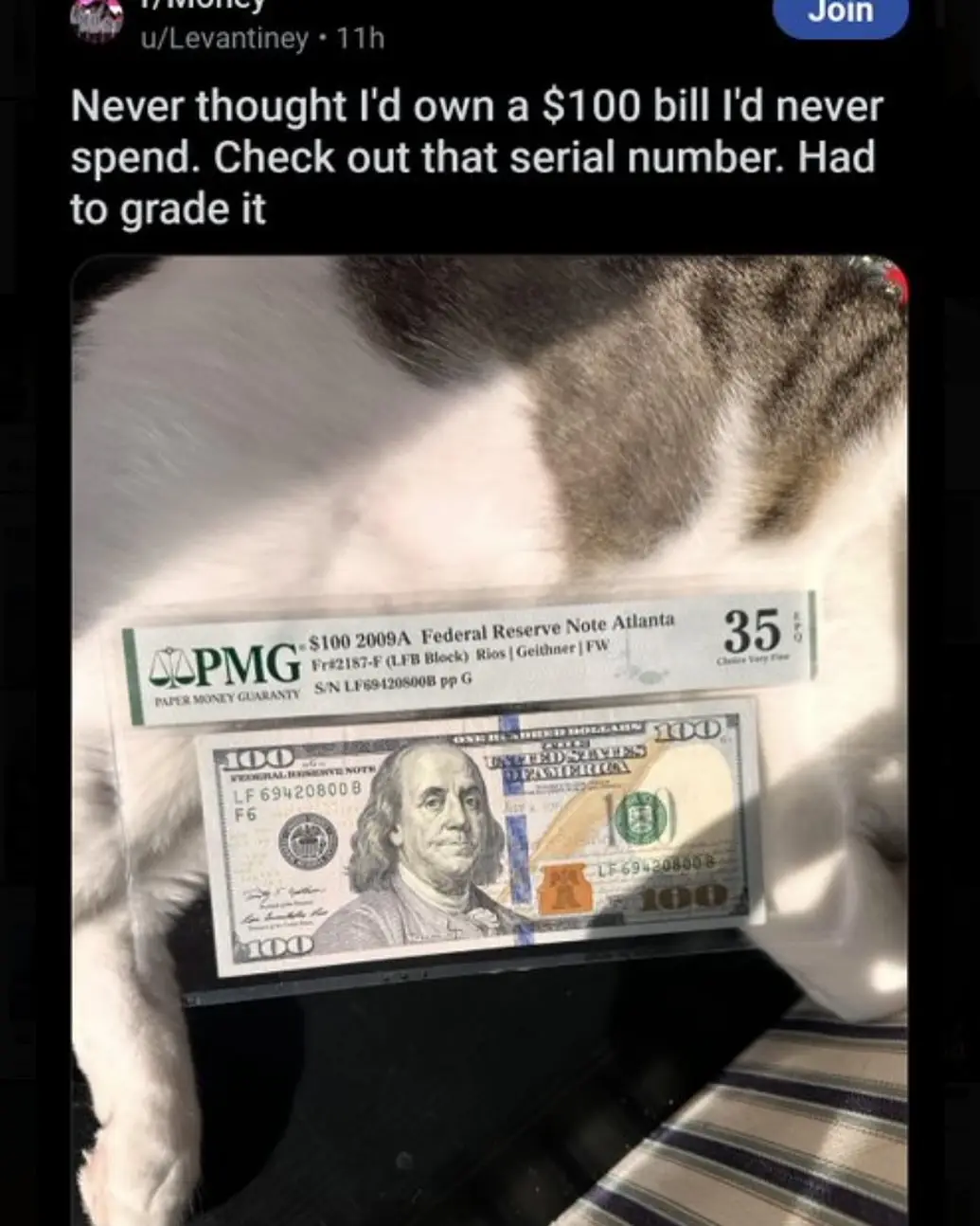 A close-up photo shows a $100 US bill encased in a protective slab with a PMG (Paper Money Guaranty) certification label…