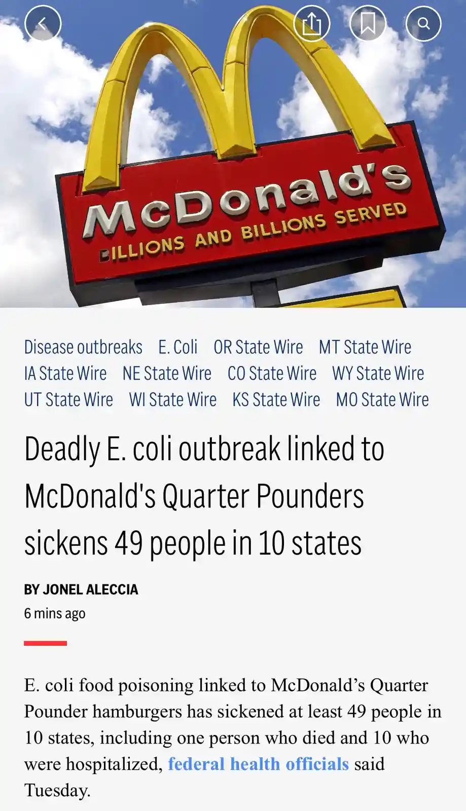 The image shows a McDonald's sign with the slogan 'BILLIONS AND BILLIONS SERVED' against a blue sky. Superimposed is a news…