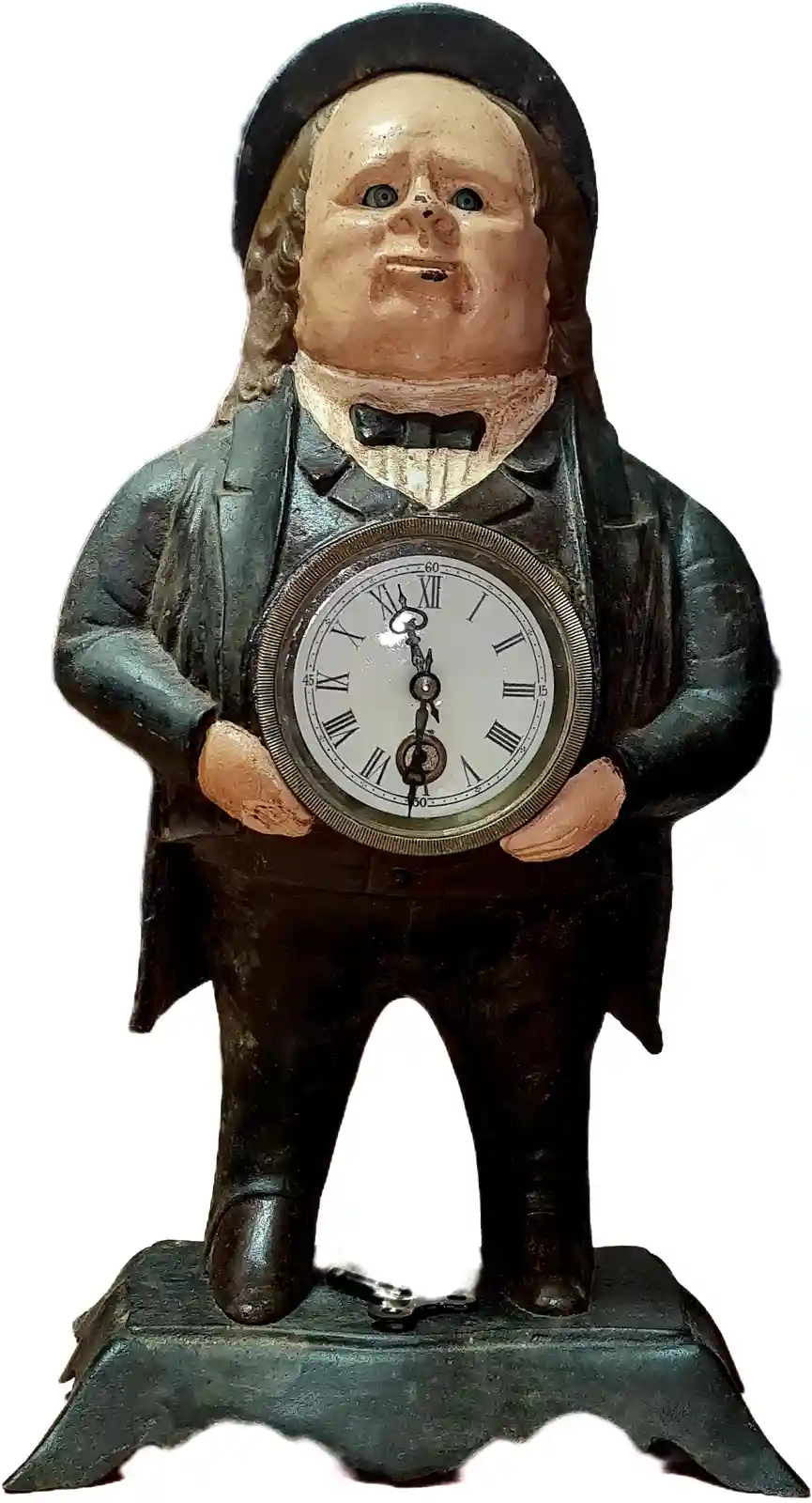 A vintage figurine of a chubby man in a top hat and bow tie holds a clock at his chest. The clock face shows Roman numerals…