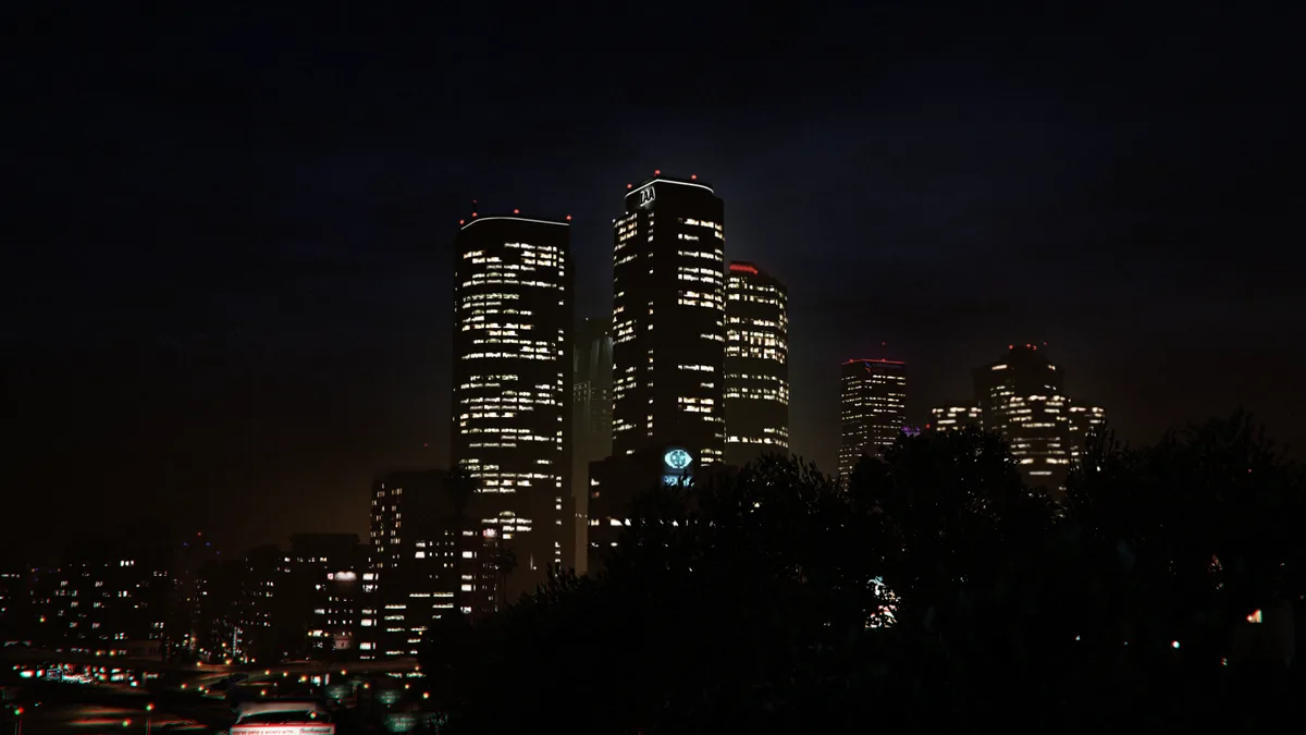 A nighttime cityscape featuring illuminated skyscrapers, including the recognizable TIAA building, with dark silhouettes of…