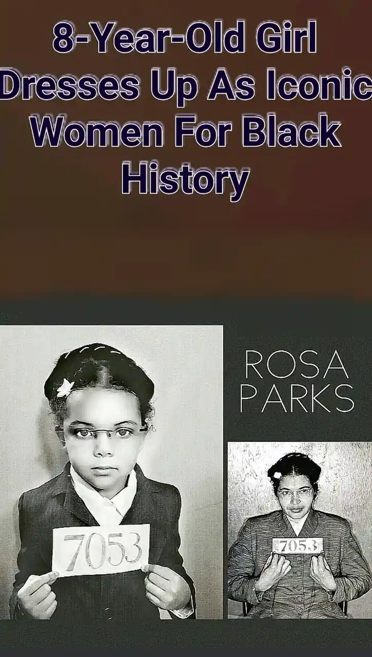 A black-and-white image shows an 8-year-old girl dressed as Rosa Parks, holding a sign with the number 7053, mimicking the…