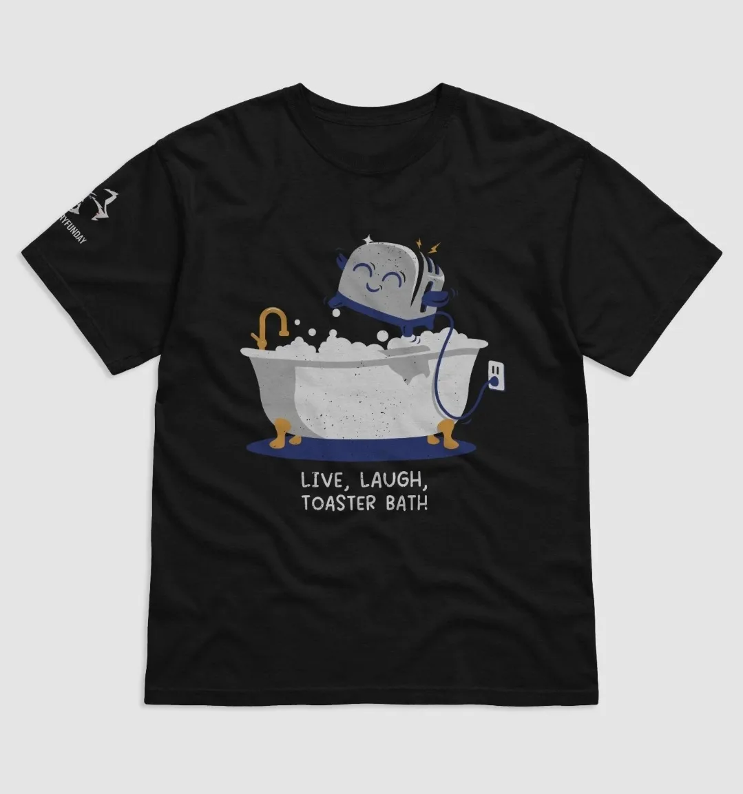A black t-shirt features a cartoon toaster with a smiling face and blue arms, happily soaking in a bubble-filled bathtub…
