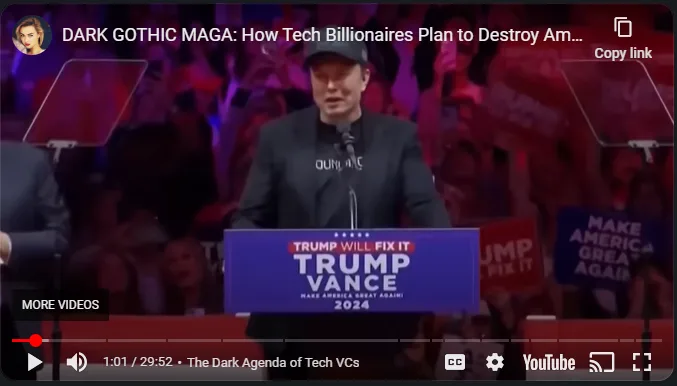 A screenshot from a YouTube video shows a man in a black suit and cap speaking at a podium with a blue sign reading 'TRUMP…