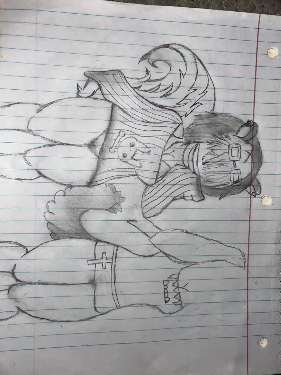 A pencil sketch on lined notebook paper depicts an anime-style character with glasses, long hair, and a cape, lying on their…