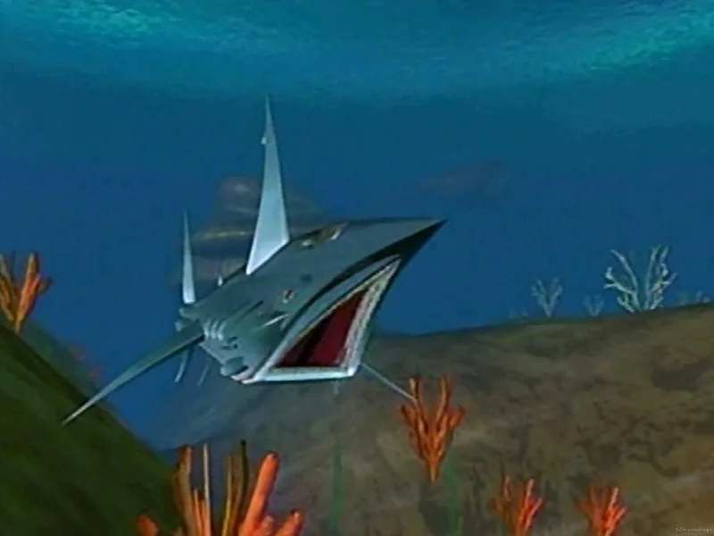 A cartoonish, silver, angular shark with a wide-open mouth swims underwater near orange coral and a sandy seabed. The image…