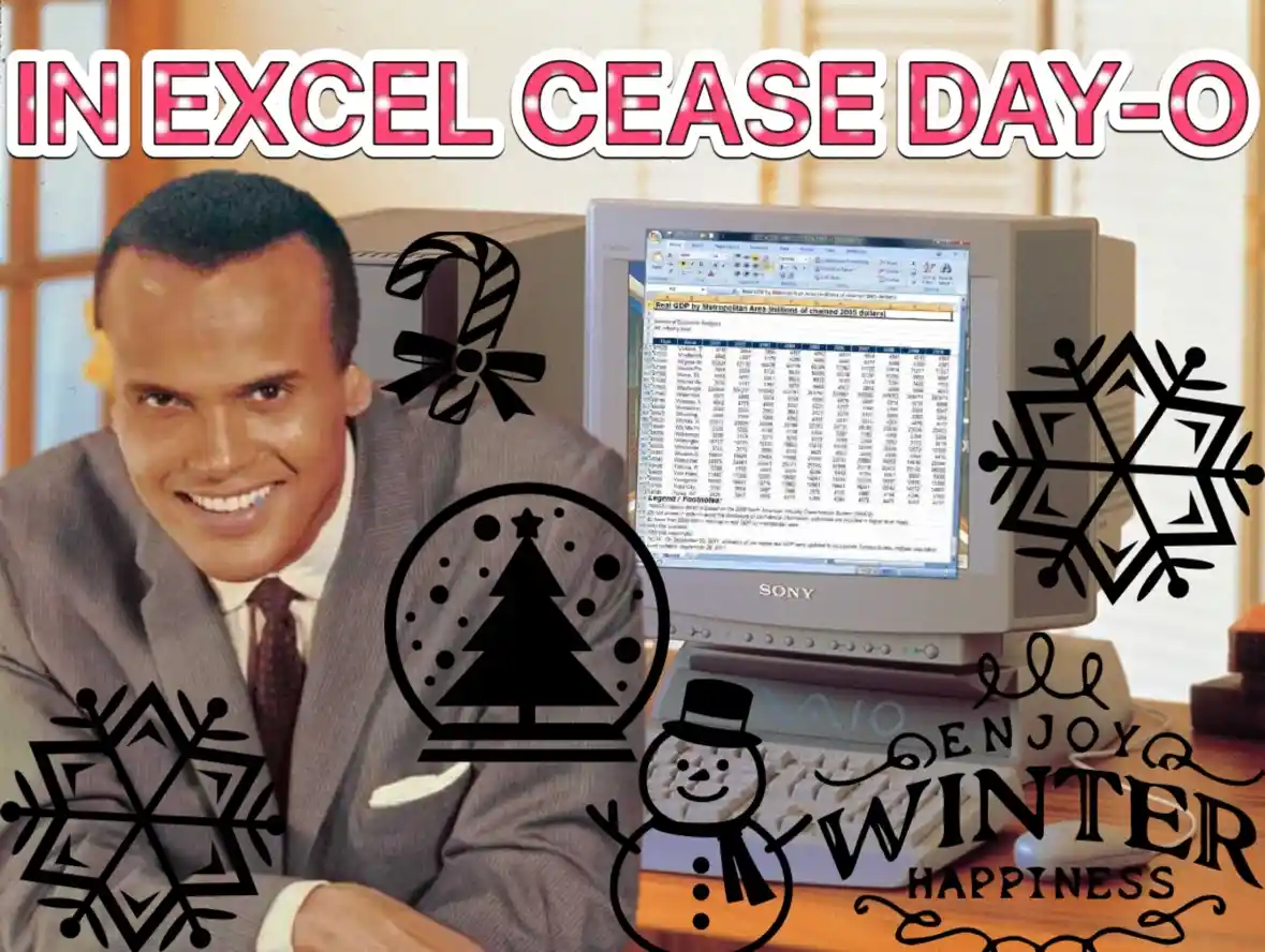 A man in a suit sits beside a vintage Sony computer displaying an Excel spreadsheet filled with economic data. The image is…