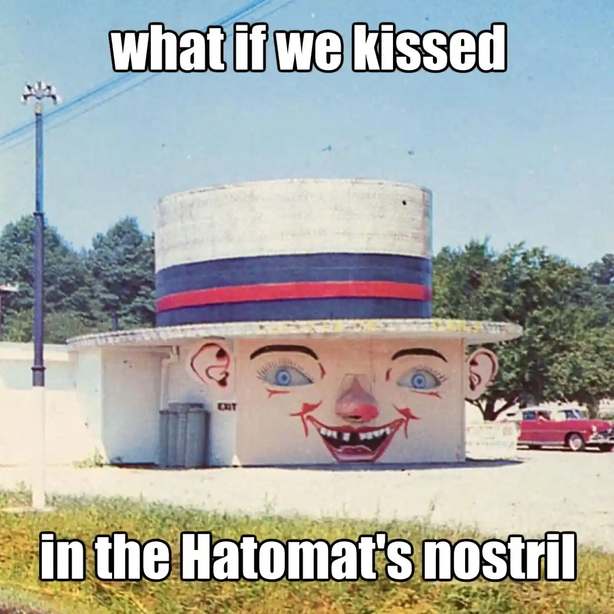 A vintage photo shows a building shaped like a giant clown's face wearing a large top hat, with text overlaid at the top and…