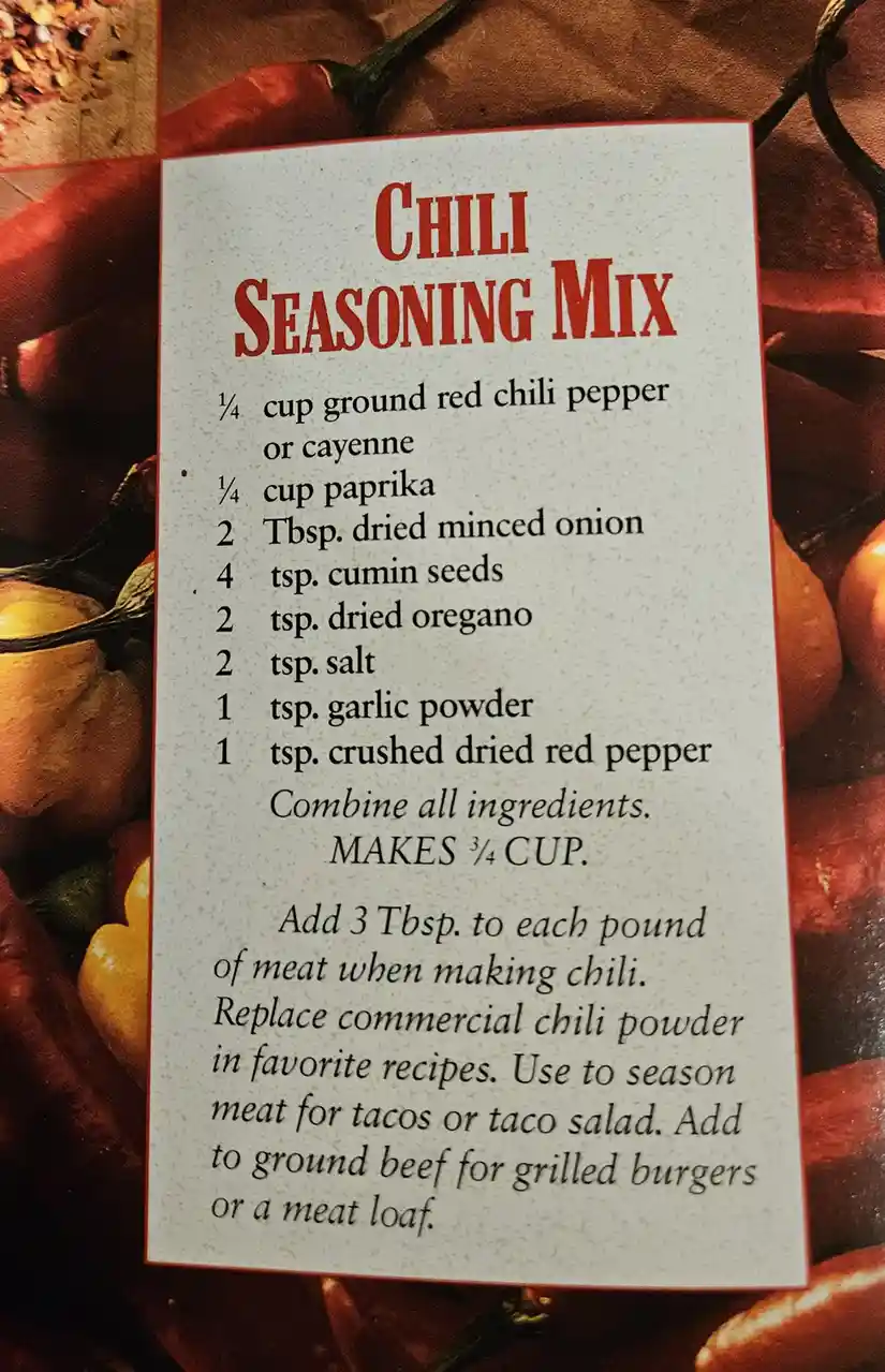 A printed recipe card for 'Chili Seasoning Mix' lists ingredients like ground red chili pepper, paprika, cumin seeds…