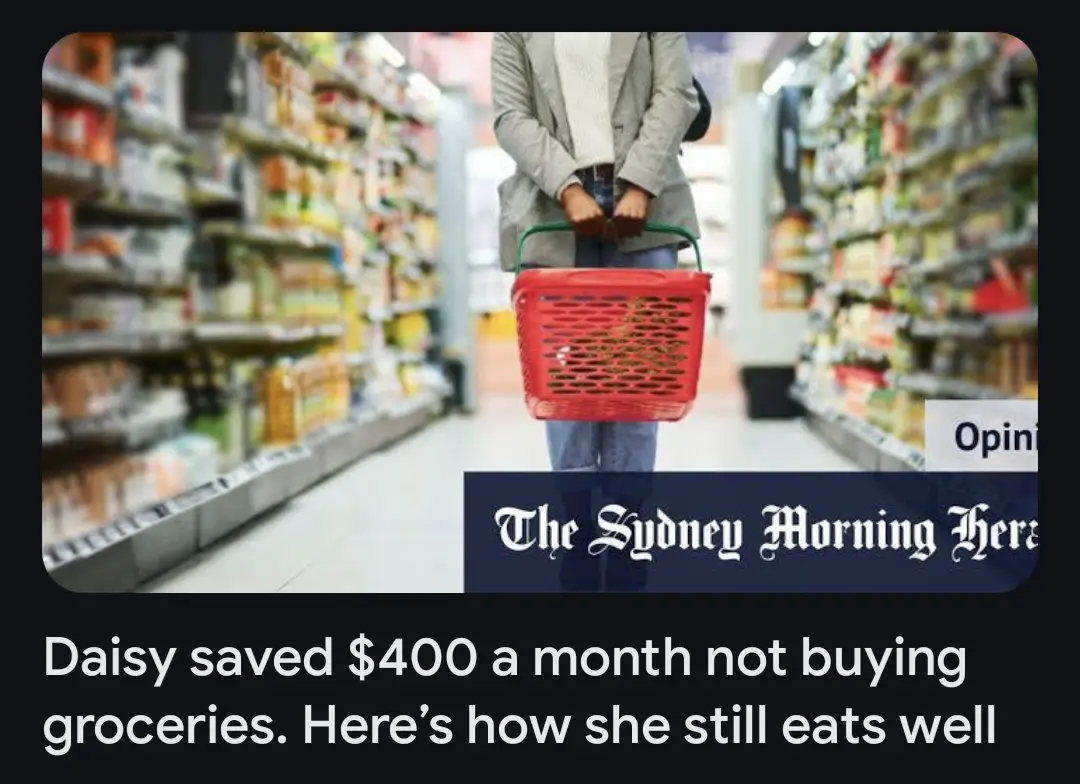 A person stands in a grocery store aisle holding an empty red shopping basket. The image is overlaid with text mimicking a…