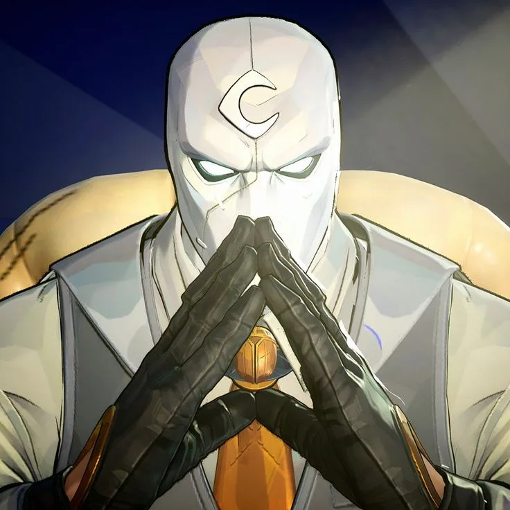A close-up of the Overwatch character Genji, wearing his white mask and black gloves, with his hands clasped together in…