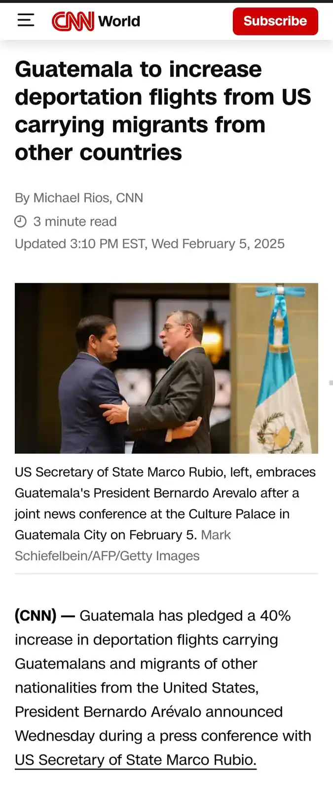 A screenshot of a CNN World news article shows two men in suits embracing each other in front of a Guatemalan flag. The…