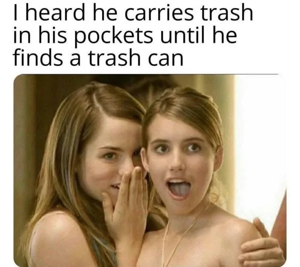 Two young women are shown in a scene where one is whispering into the other's ear while the other reacts with wide-eyed…