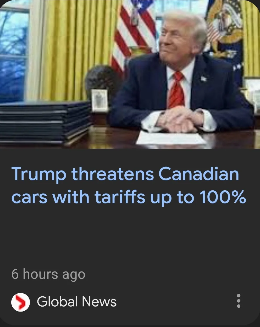 A screenshot of a news article from Global News, showing Donald Trump seated at a desk in an office with American flags and…