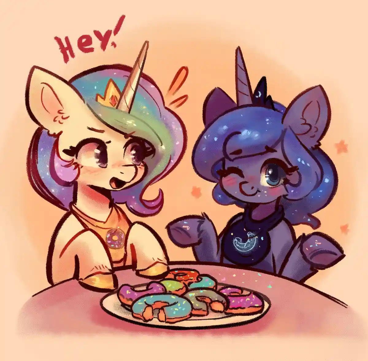 Two cartoon unicorns sit at a table with a plate of colorful donuts. The unicorn on the left, with rainbow hair and a crown…