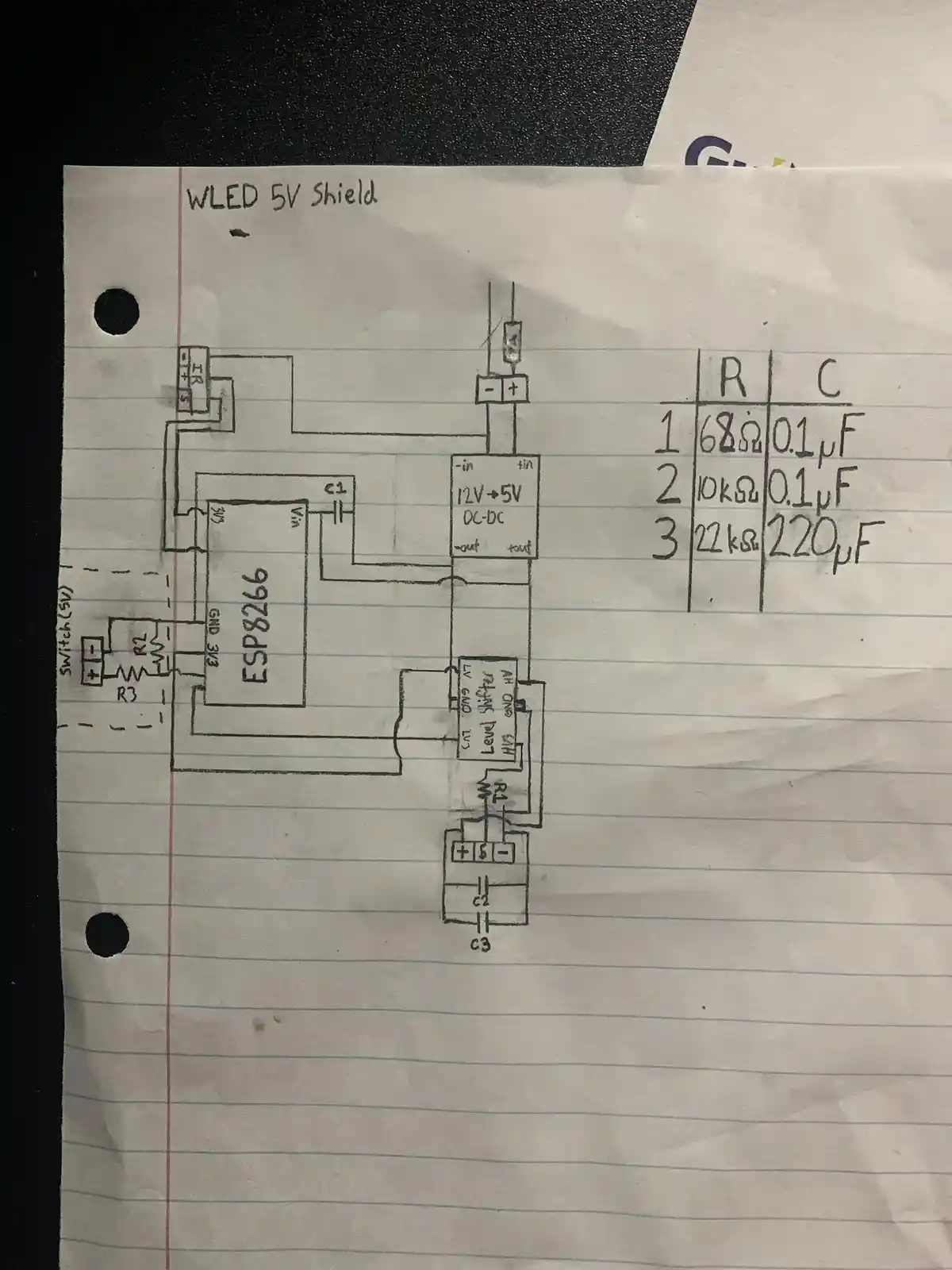 A hand-drawn schematic on lined paper shows an electronic circuit labeled 'WLED 5V Shield' featuring an ESP8266…