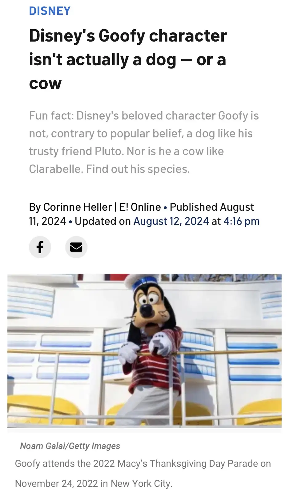 The image shows a person in a Goofy costume standing on a parade float, wearing a sailor hat, red-and-white striped shirt…