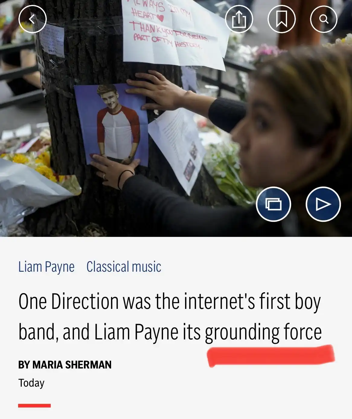 A woman places a photo of Liam Payne on a tree covered in flowers and handwritten notes, overlaid with a news article…