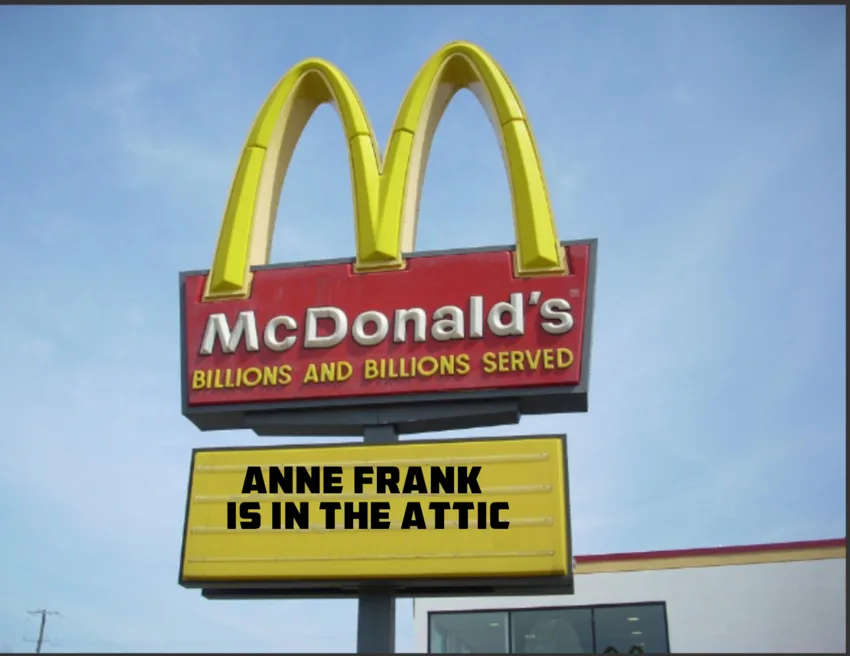 A McDonald's sign with its iconic golden arches and red background reading 'McDonald's BILLIONS AND BILLIONS SERVED' has a…