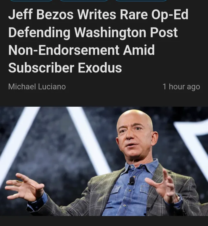 A screenshot of a news article headline about Jeff Bezos writing an op-ed defending the Washington Post's non-endorsement…