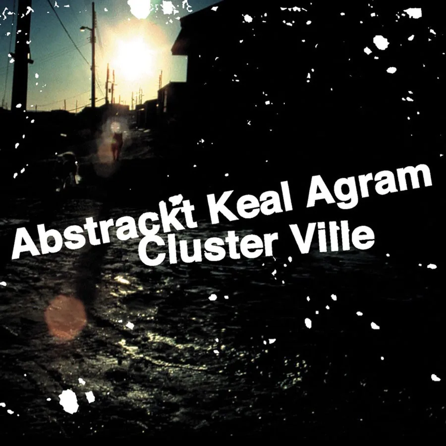 A gritty, sun-drenched street scene with silhouetted buildings and power lines, overlaid with the text 'Abstrackt Keal Agram…